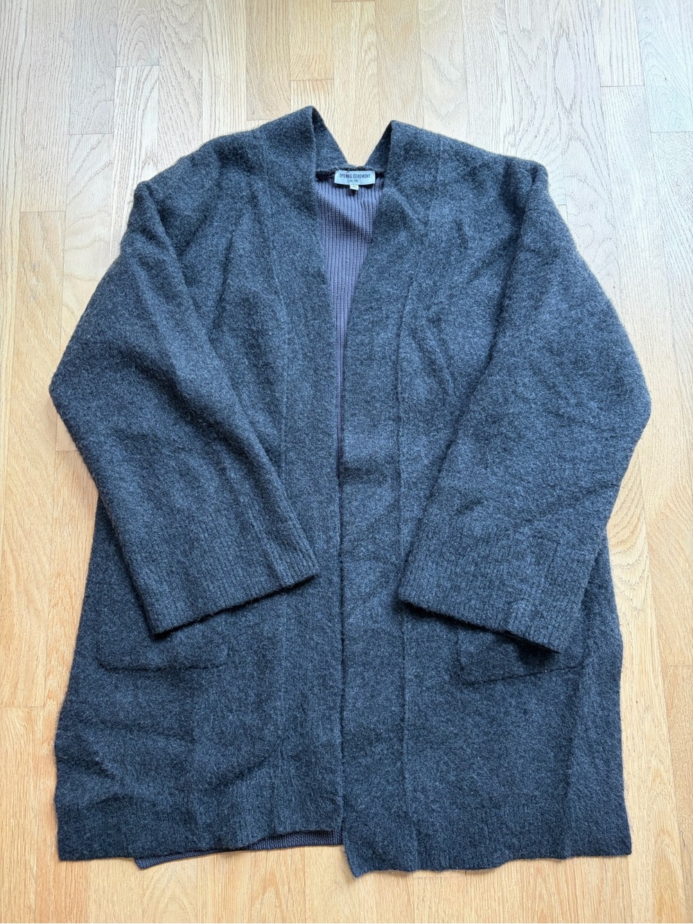 Opening ceremony, Cashmere cardigan